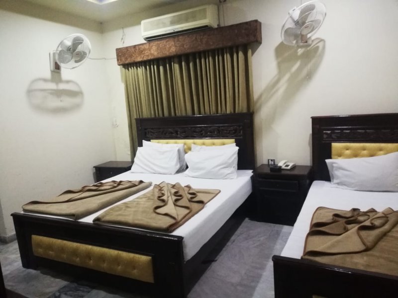 Hotel Al Hateem Hotel Faizabad Triple beded Room Front View For 3 to 4 Person